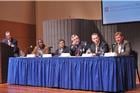 Professor Robert Sicina and panelists Roy Dunbar, Shiv Krishnan, William 